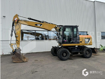 Escavadeira de rodas CATERPILLAR M313D