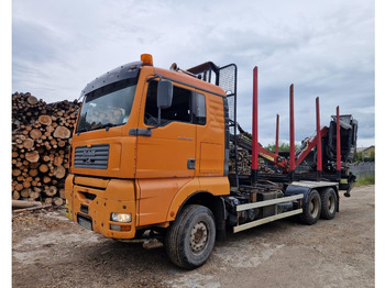 Camião de transporte de madeira MAN TGA 33.530