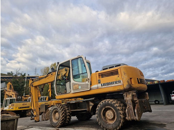 Escavadeira de rodas LIEBHERR A904C: foto 2