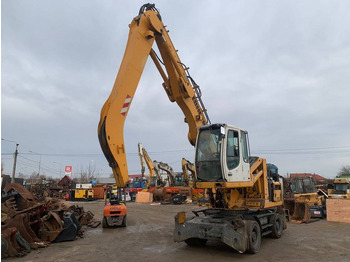 Escavadeira de rodas LIEBHERR A 904 C