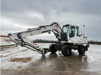 Escavadeira de rodas LIEBHERR A 904 C